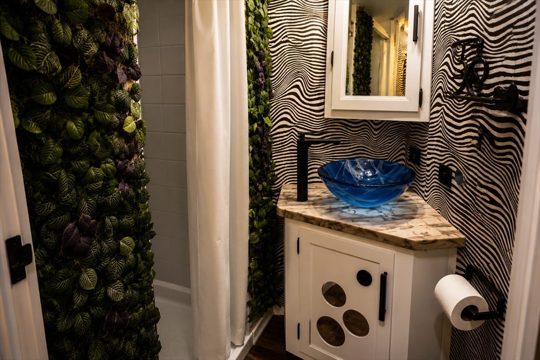 BigTopHop optical-illusion bathroom with blue bowl sink