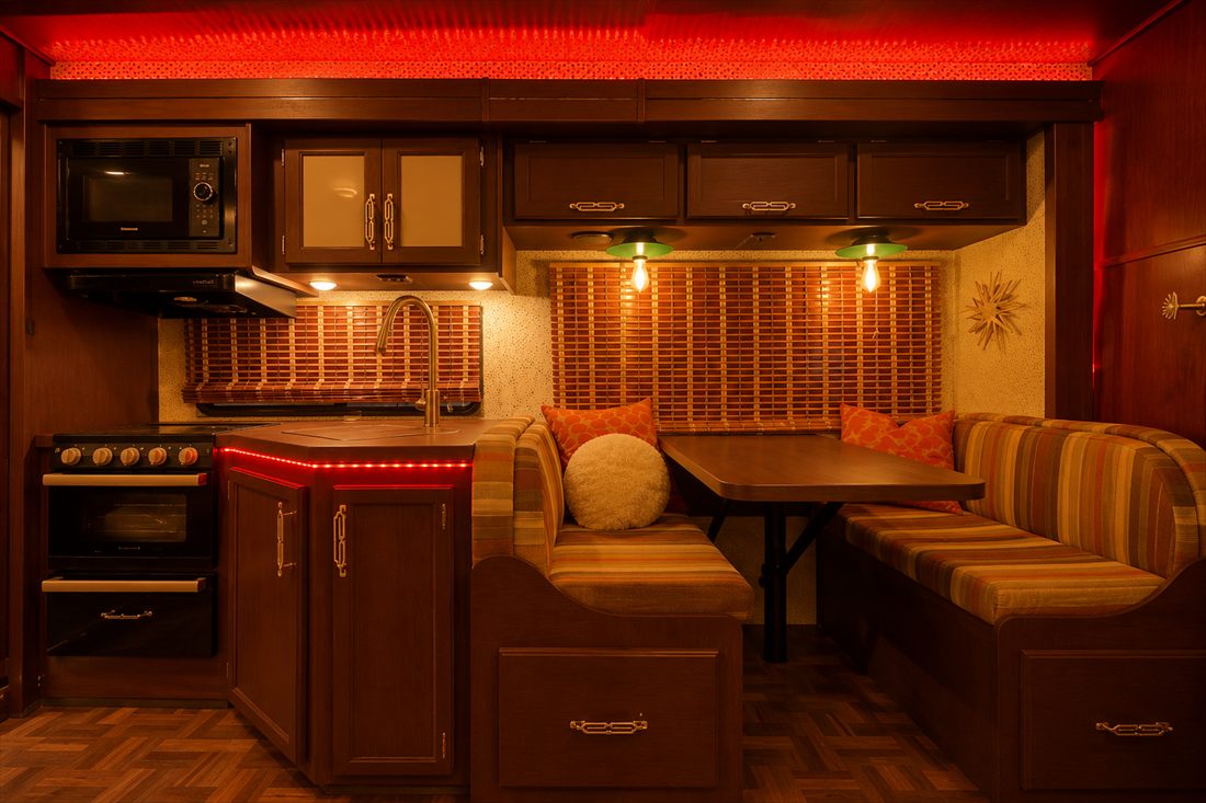 Stiggypop golden-lit dinette at night